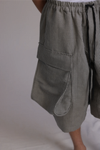 ALBI Yu Pants, oversized cotton cargo shorts with large utility pockets