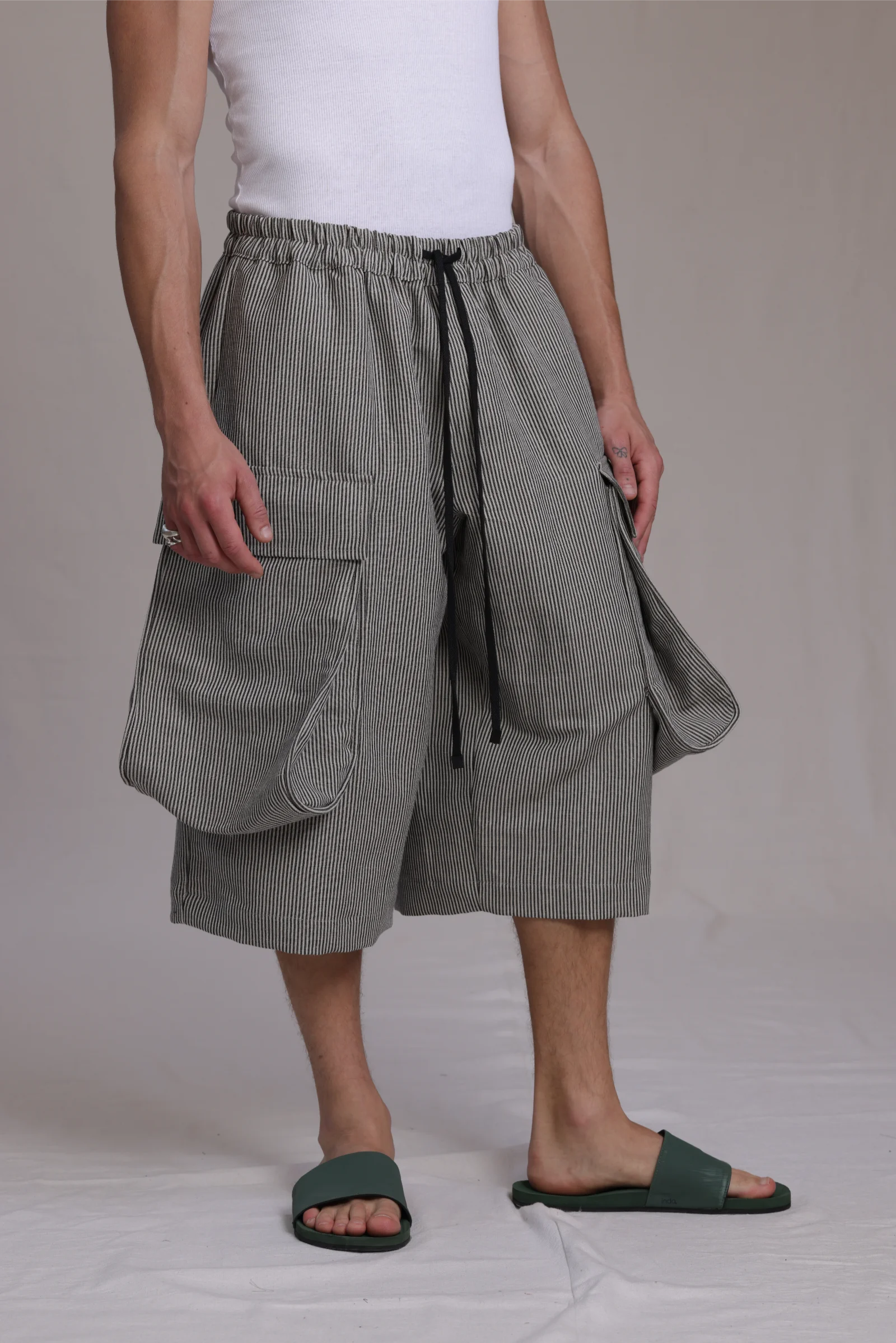 ALBI Yu Pants, oversized cotton cargo shorts with large utility pockets