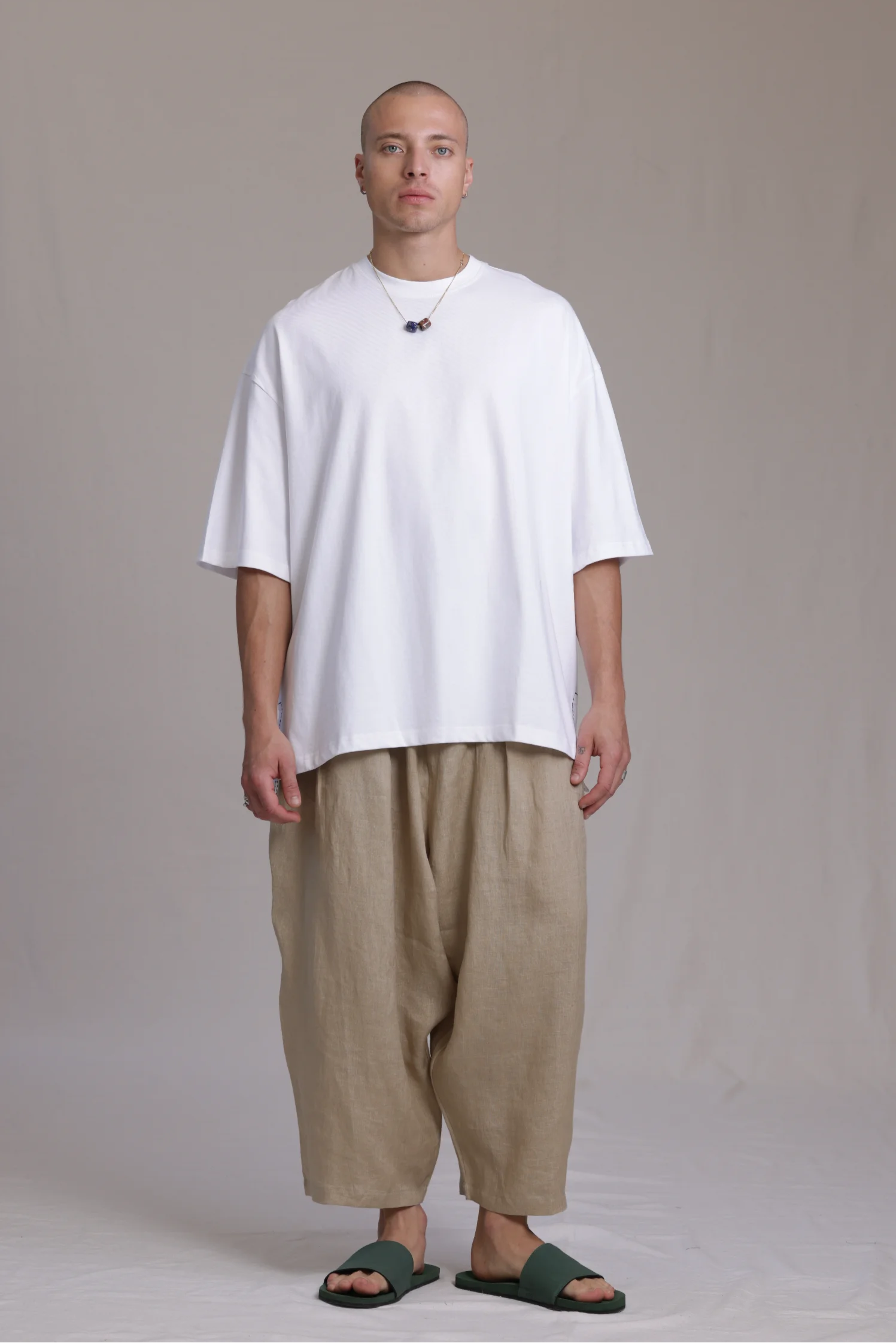 ALBI Sapan Shirt, an oversized short sleeve cotton jersey tee with hand-stitched side slits