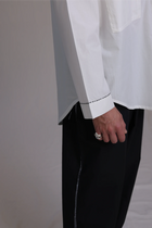 ALBI Zen Shirt, an oversized cotton poplin band collar shirt with hand-stitched detailing