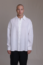 ALBI Toki Shirt, an oversized linen shirt with a classic collar and tonal hand-stitched detailing
