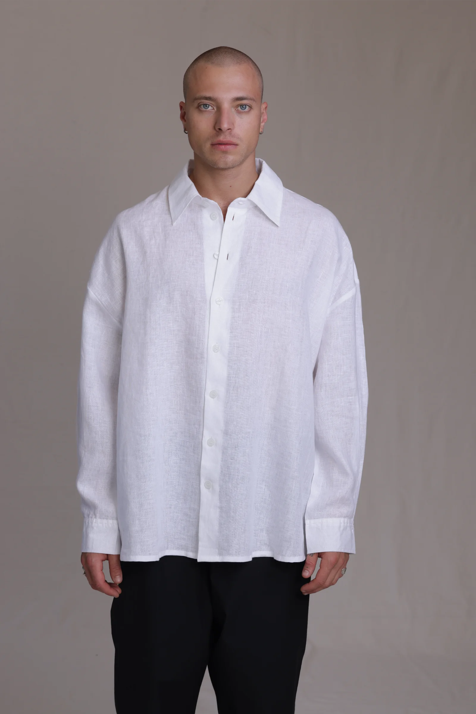 ALBI Toki Shirt, an oversized linen shirt with a classic collar and tonal hand-stitched detailing