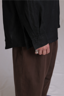 ALBI Toki Shirt, an oversized linen shirt with a classic collar and tonal hand-stitched detailing