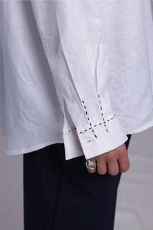 ALBI Kaze Shirt, an oversized linen shirt with a classic collar and bold hand-stitched detailing