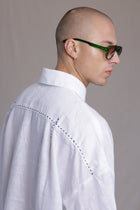 ALBI Kaze Shirt, an oversized linen shirt with a classic collar and bold hand-stitched detailing