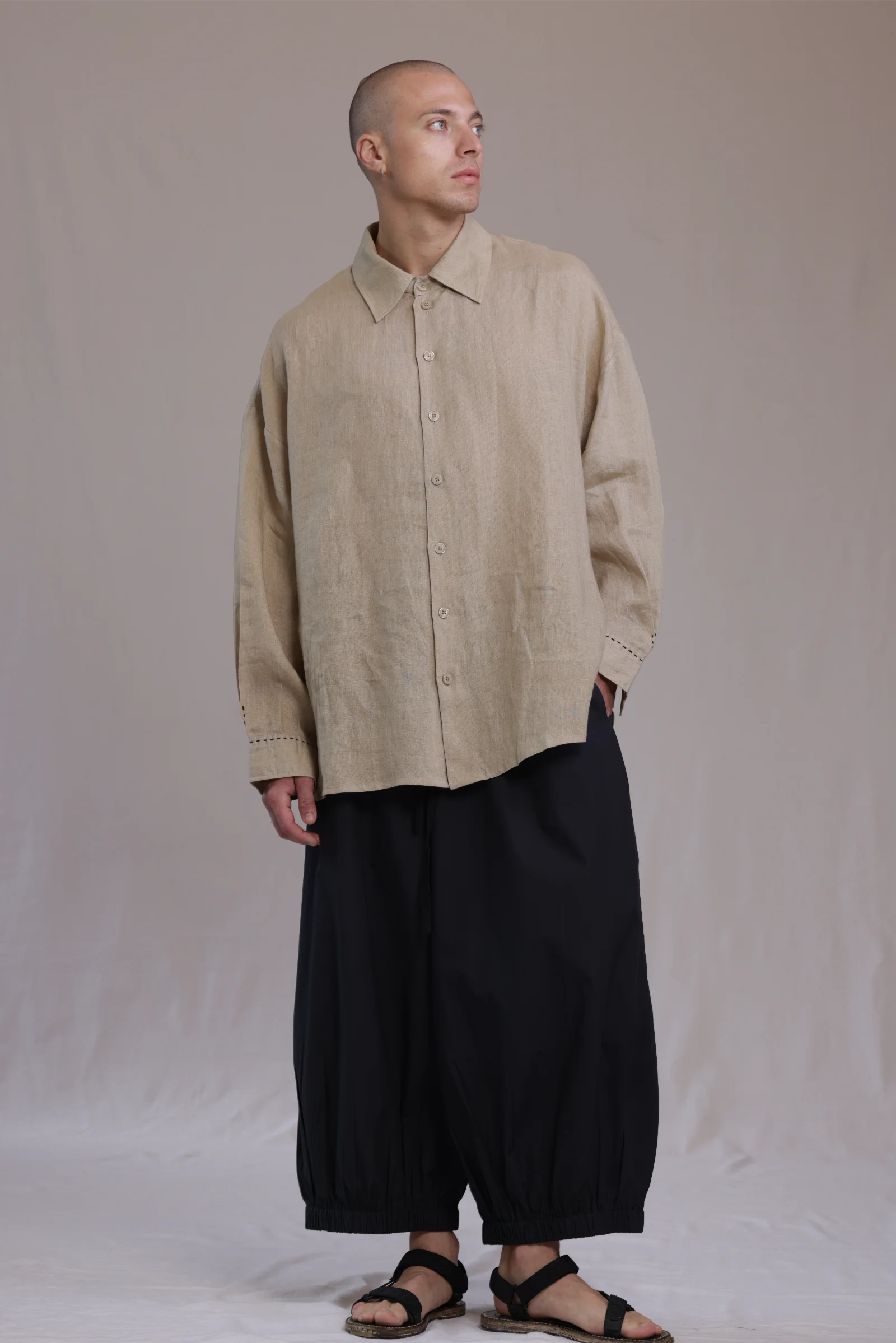 ALBI Kaze Shirt, an oversized linen shirt with a classic collar and bold hand-stitched detailing