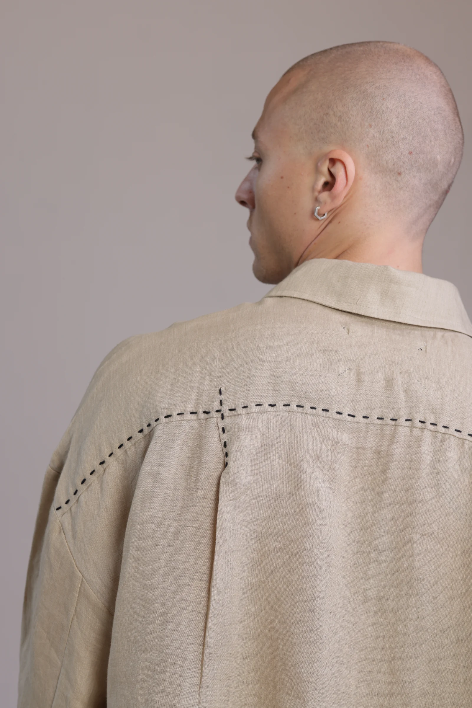 ALBI Kaze Shirt, an oversized linen shirt with a classic collar and bold hand-stitched detailing