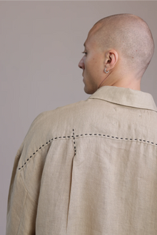ALBI Kaze Shirt, an oversized linen shirt with a classic collar and bold hand-stitched detailing