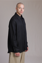 ALBI Kaze Shirt, an oversized linen shirt with a classic collar and bold hand-stitched detailing
