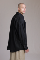 ALBI Kaze Shirt, an oversized linen shirt with a classic collar and bold hand-stitched detailing