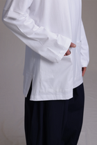 ALBI Tsuki Shirt, an oversized long sleeve cotton jersey tee with patch pockets and side slits