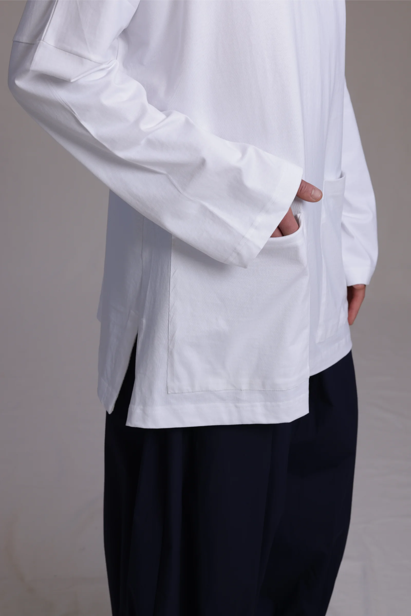 ALBI Tsuki Shirt, an oversized long sleeve cotton jersey tee with patch pockets and side slits