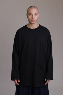 ALBI Tsuki Shirt, an oversized long sleeve cotton jersey tee with patch pockets and side slits