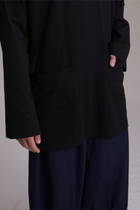 ALBI Tsuki Shirt, an oversized long sleeve cotton jersey tee with patch pockets and side slits