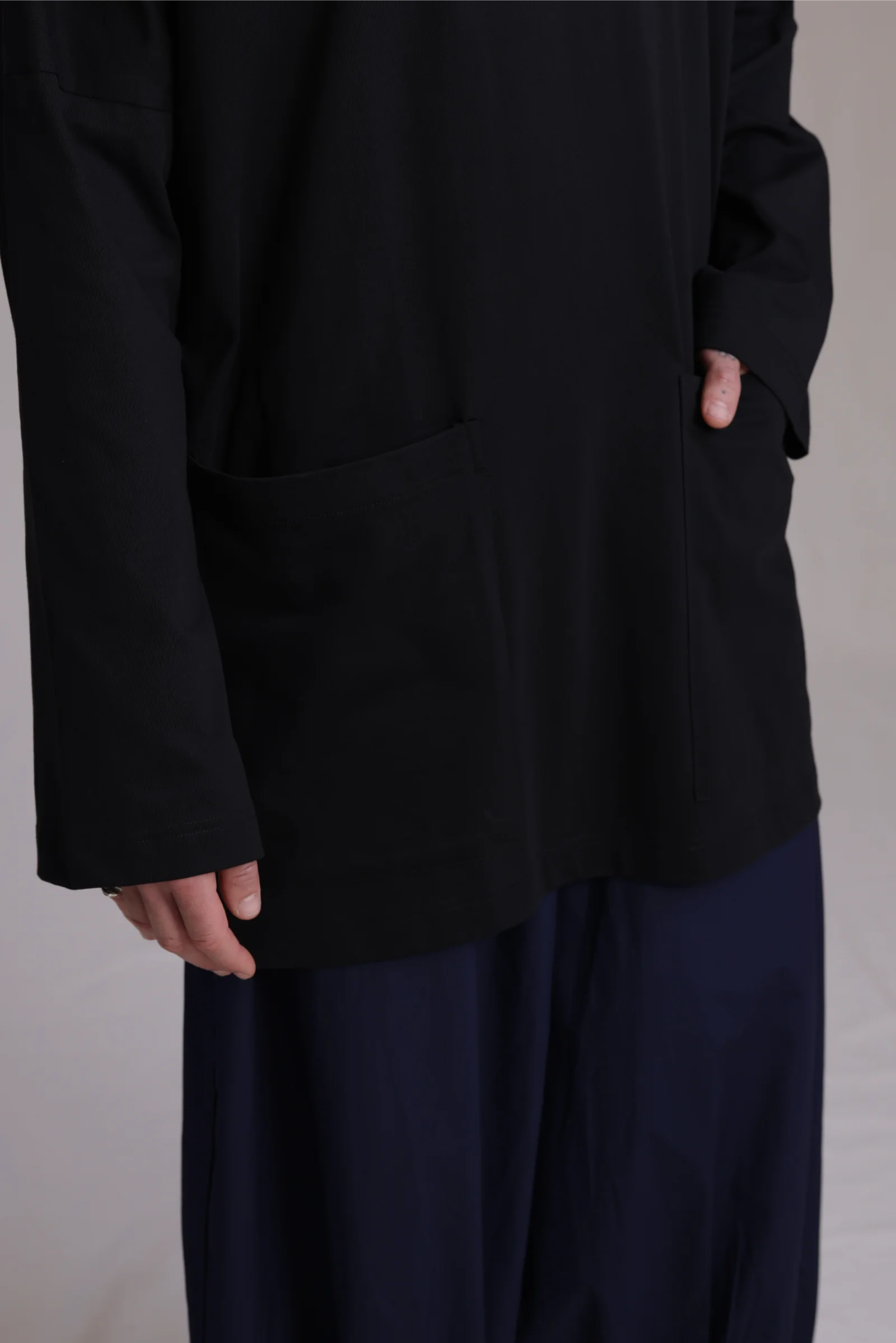 ALBI Tsuki Shirt, an oversized long sleeve cotton jersey tee with patch pockets and side slits