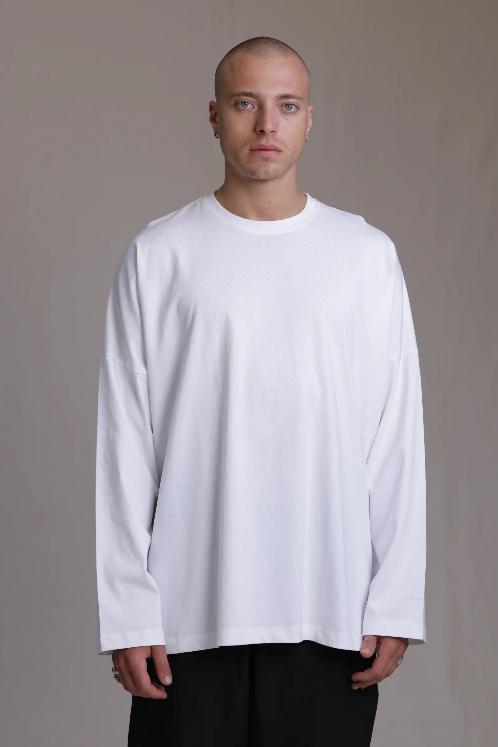 ALBI Michi Shirt, an oversized long sleeve cotton jersey tee with hand-stitched side slits