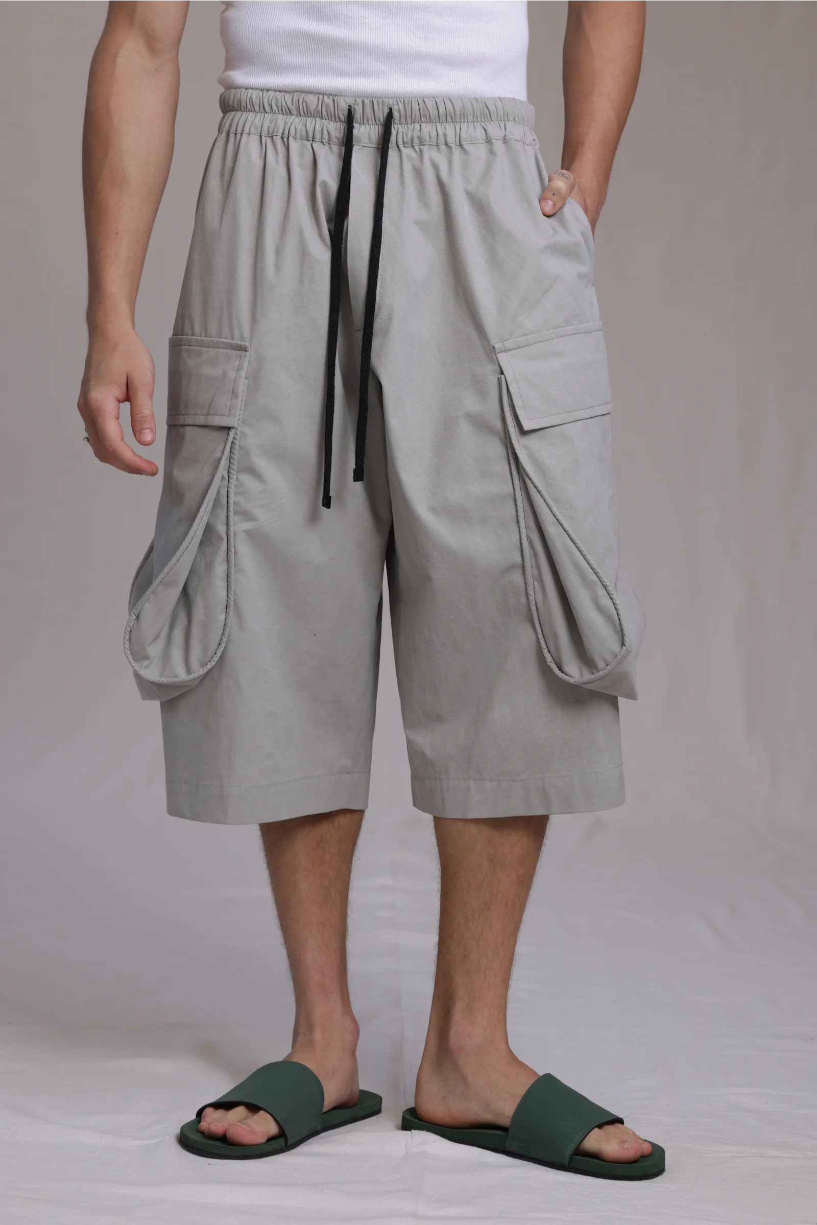 ALBI Yu Pants, oversized cotton cargo shorts with large utility pockets