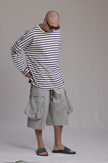 ALBI Yu Pants, oversized cotton cargo shorts with large utility pockets