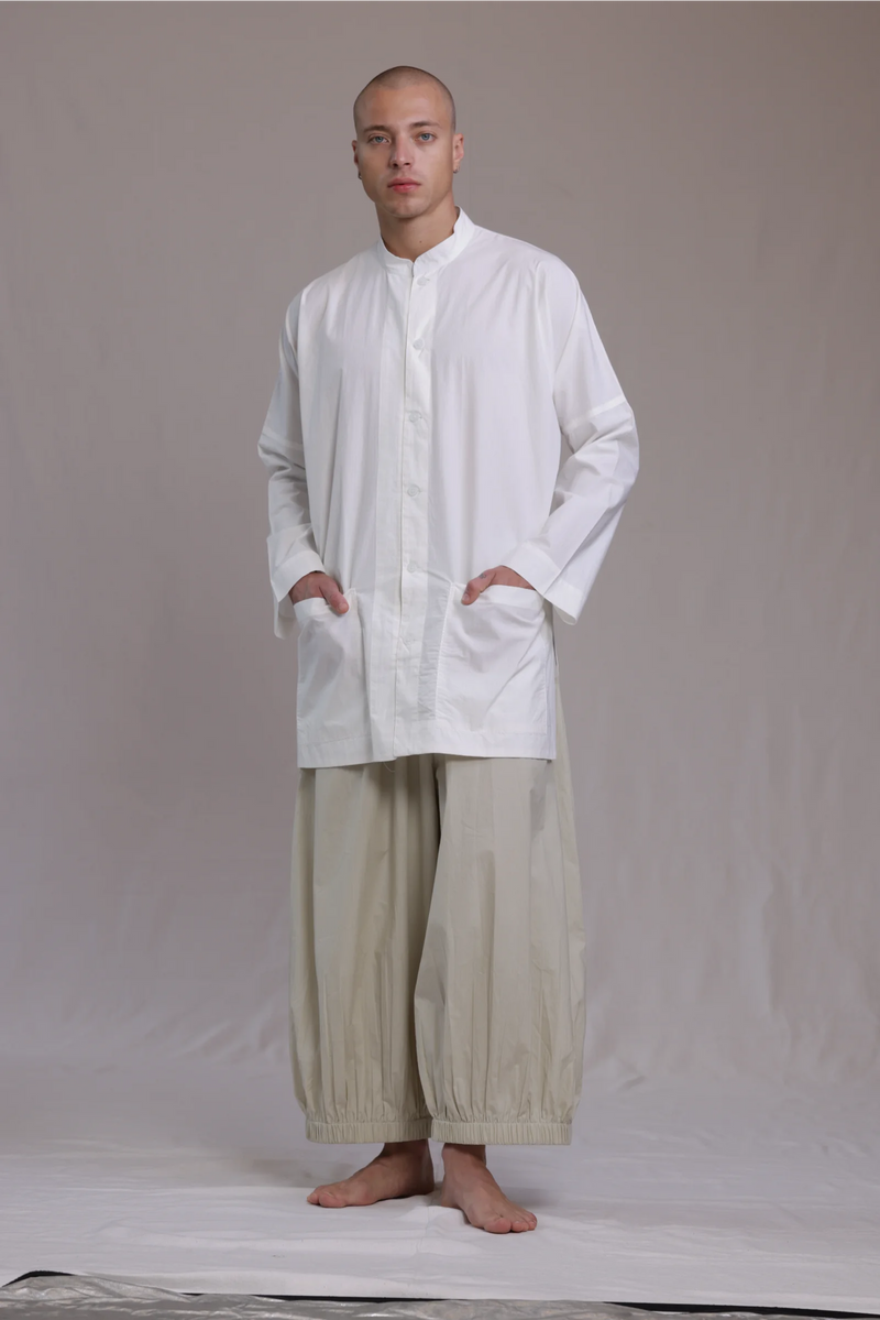 ALBI Sei Shirt, a long oversized cotton poplin band collar shirt with low patch pockets